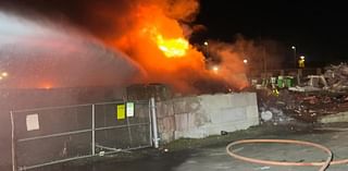 PHOTOS: Tampa scrap yard found engulfed in flames