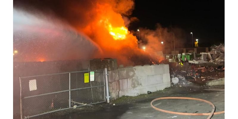 PHOTOS: Tampa scrap yard found engulfed in flames