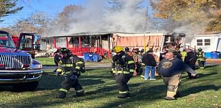 Elbridge man and dog safe after his mobile home catches fire