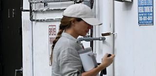 Pregnant Gisele Bundchen looks effortlessly chic in a grey linen shirt as she heads to pilates class in Miami