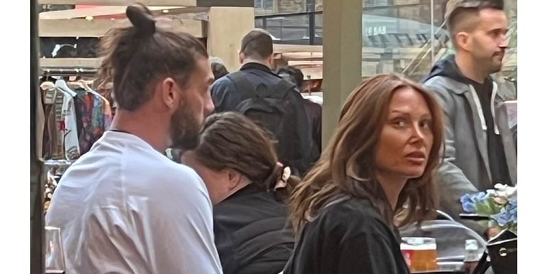 Andy Carroll is pictured on a date with makeup artist Lou Teasdale as the pair are seen for the first time after 'growing close' following his shock split from wife Billi Mucklow