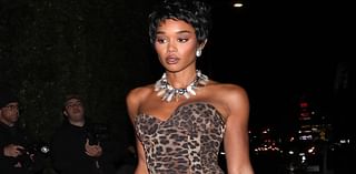 Laura Harrier puts on a leggy display in a leopard print minidress for Kendall Jenner's Halloween party