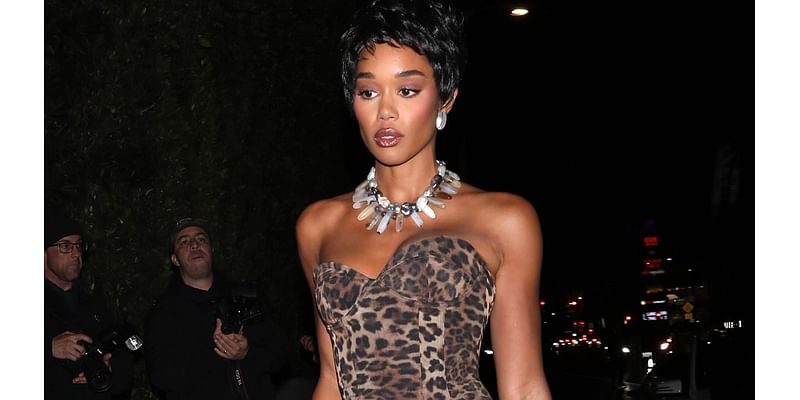 Laura Harrier puts on a leggy display in a leopard print minidress for Kendall Jenner's Halloween party