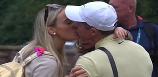 Rory McIlroy's marriage appears to be back on track as golfer kisses wife Erica Stoll while hugging four-year-old daughter Poppy moments after another heartbreaking late loss