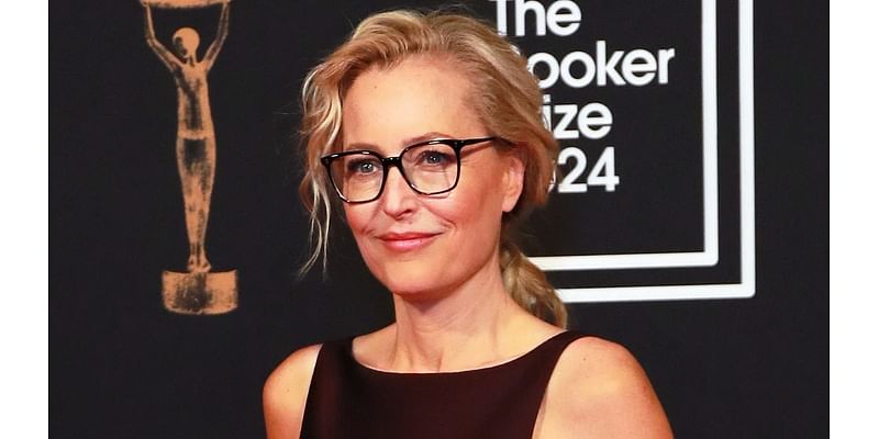 Gillian Anderson looks the epitome of sophistication in a dark red dress as she joins Charles Dance at the Booker Prize 2024 winners event