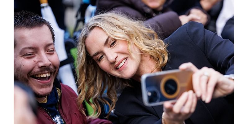 Kate Winslet snaps selfies with fans as she is award the Golden Icon Award during the Zurich Film Festival