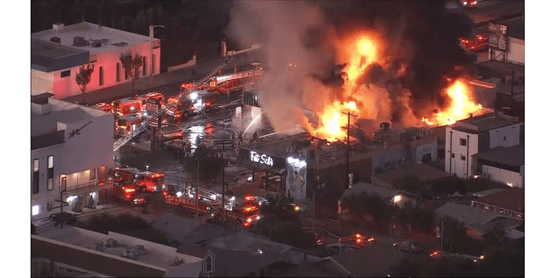 Fire at AutoZone store tears through strip mall in Hollywood