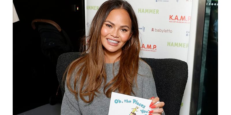 Chrissy Teigen looks chic in gray sweater and white skirt at the Hammer Museum alongside her children in LA