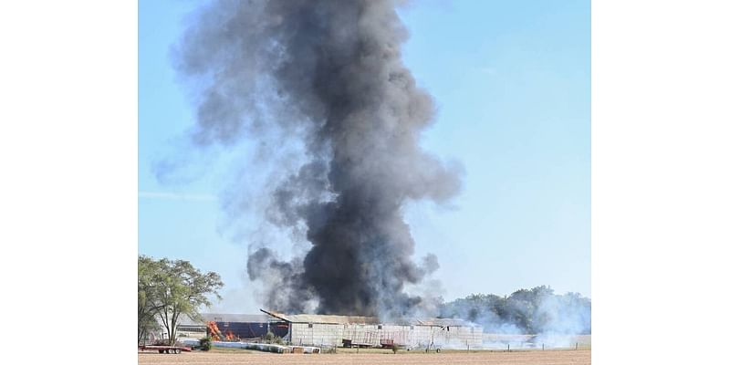 Smoke pours from Miami County barn as crews tackle flames