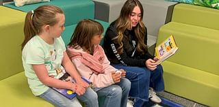 High schoolers read to elementary children: 'It's always nice to come back'