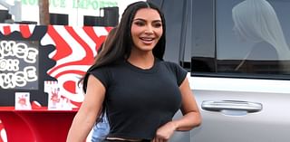 Kim Kardashian rocks a tiny black T-shirt as she and sister Khloe mingle with BJ Novak at ChainFEST LA