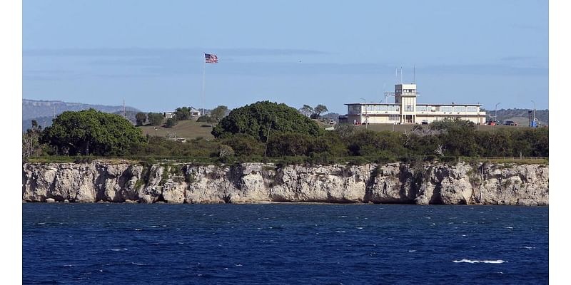 Report: Migrants held in Guantanamo Bay face difficult living conditions. U.S. denies it