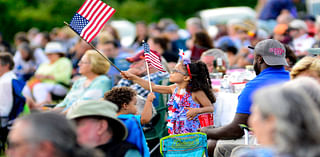 Americans celebrating 4th of July independence with parades, cookouts, lots of fireworks