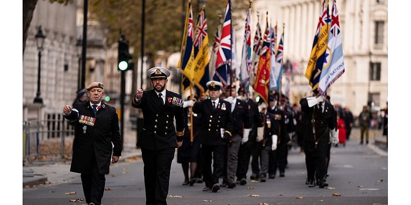 Members of the armed forces march for the annual AJEX parade to remember Jewish servicemen and women 'who fought and served for freedom since World War I'