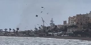 Shocking moment tornado sends debris flying on Malaga beach as footage shows the Costa del Sol hit by water spouts, floods and torrential rain in latest storms to hit Spain