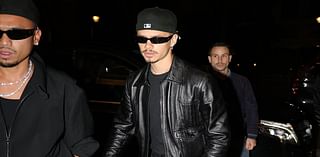 Romeo Beckham cuts a stylish figure in a black biker jacket in Paris as he looks to 'launch his career in fashion'