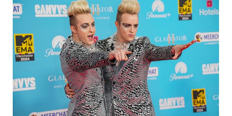 Jedward put on a VERY animated display in matching sequinned suits as they lark about on the red carpet at the star-studded MTV EMAs