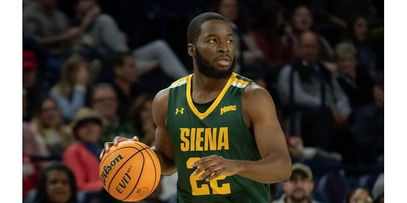 NCAA BASKETBALL: Siena edged by Milwaukee in final second