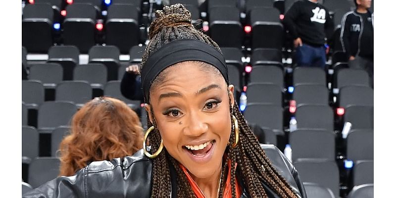 Floyd Mayweather sits courtside as he joins Tiffany Haddish at basketball game between the Los Angeles Clippers and the Utah Jazz