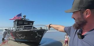 Boat involved in Coast Guard rescue washes ashore on San Francisco's Ocean Beach