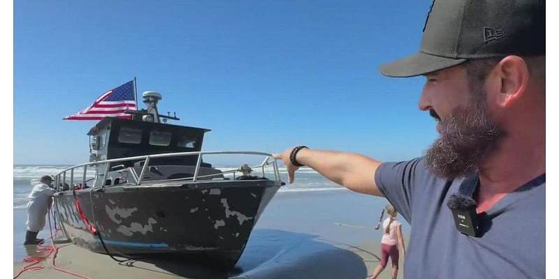 Boat involved in Coast Guard rescue washes ashore on San Francisco's Ocean Beach