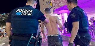 Police manhunt after two groups of British tourists battle each other in huge brawl on notorious Magaluf strip close to spot where Irish father collapsed and died