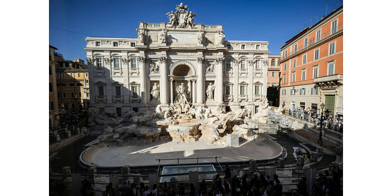 Tourists Toss Coins Over Makeshift Pool as Rome’s Trevi Fountain Undergoes Maintenance