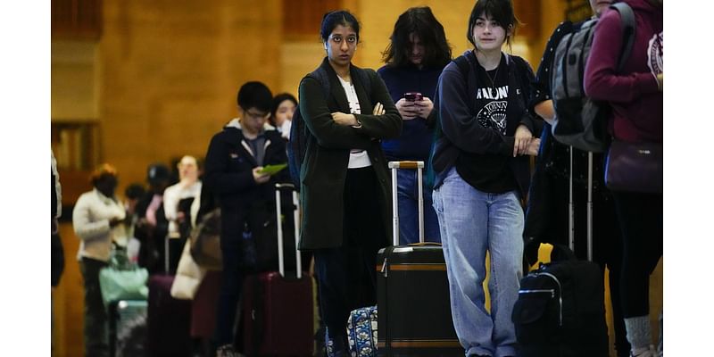 Record Thanksgiving travel rush off to a smooth start despite snowy forecast