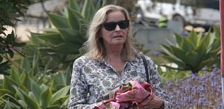 Actress famed for iconic sexy beach scene in late 70s goes virtually unnoticed while shopping in California - can you guess who it is?