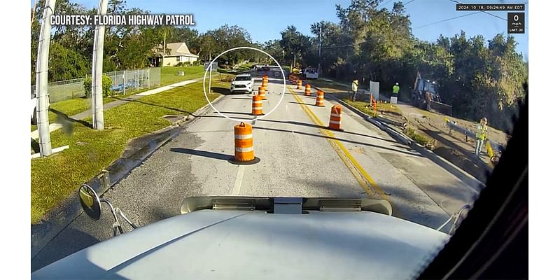 Driver hits Pinellas workers after blowing through barricades blocking flooded road: FHP