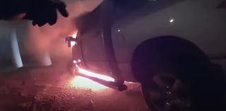 Dramatic moment man is pulled from his burning pick-up truck