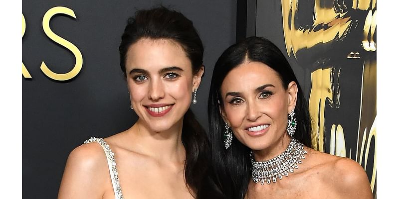 Demi Moore, 61, and The Substance co-star Margaret Qualley, 30, stun in black and white dresses as they reunite at the 15th annual Governors Awards in LA