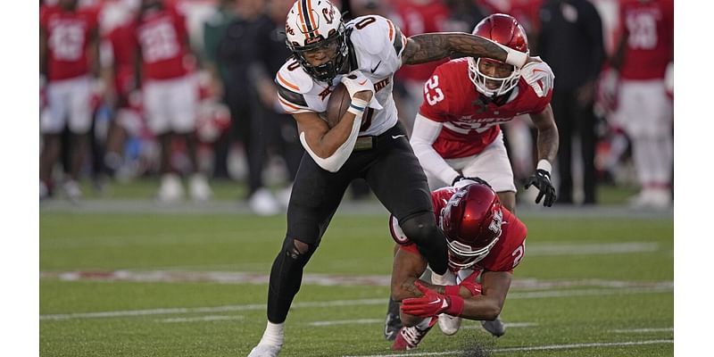 No. 21 Oklahoma State faces BYU with possible Big 12 title game berth on the line