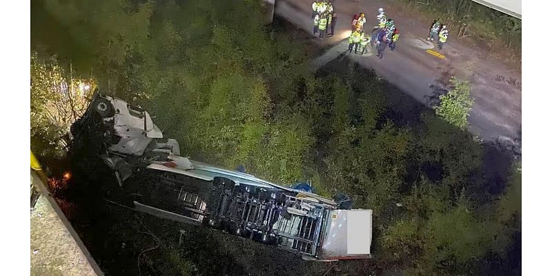 Motorway warning after lorry falls 60m from bridge