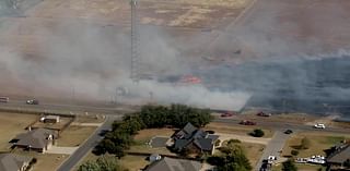 Firefighters battle multiple grass fires near Guthrie