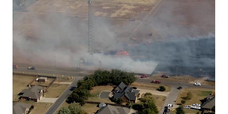 Firefighters battle multiple grass fires near Guthrie