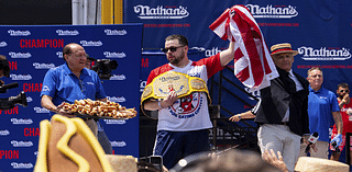 Pics: 'I wasn't going to stop eating until the job was done,' 1st-time hot dog winner says