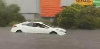 Roads turn to rivers as drivers are stranded in their cars amid raging flood waters and thousands are left without power following 'supercell' storm in Victoria and South Australia