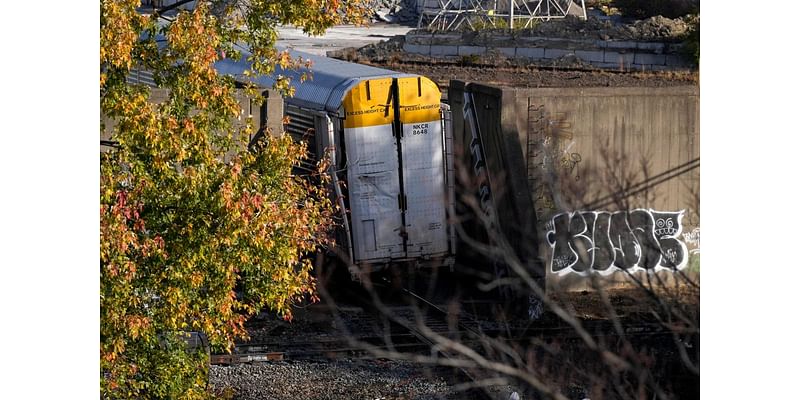 Removal of train cars after derailment in Queensgate