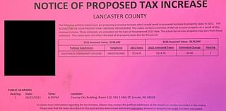 Dozens voice concerns at heated 'pink postcard' tax hearing for LPS