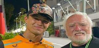 Pictured: F1 stars Lando Norris and George Russell pose for a snap with meme sensation 'Hide the Pain Harold' in the Singapore Grand Prix paddock