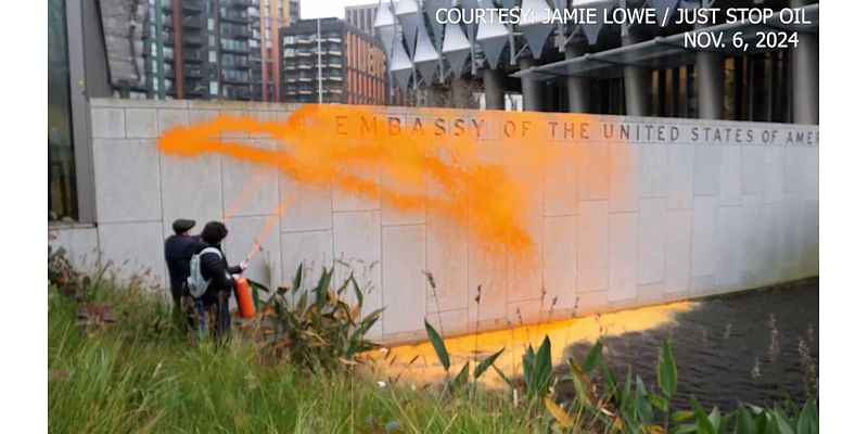 Climate activists spray US embassy in London with orange paint after Trump reelection victory