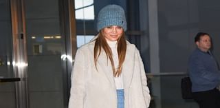 Jennifer Lopez looks 70s chic in bell-bottom denim as she arrives at JFK airport