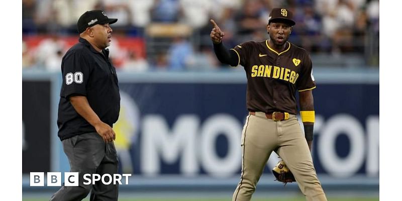 LA Dodgers-San Diego Padres game delayed after fans throw baseballs and beer at Jurickson Profar