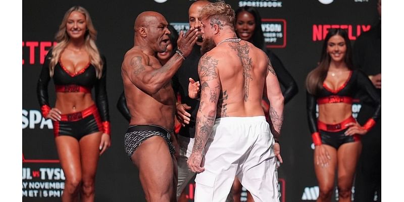 Mike Tyson slaps Jake Paul across face during weigh