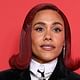 Alex Scott shows off a preppy new look as she rocks a red wig and structured velvet blazer for the GQ Men Of The Year Awards