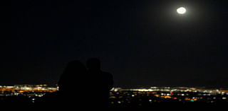 Las Vegas residents see partial eclipse combine with harvest moon — PHOTOS