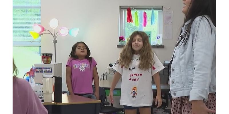 Burlington third-grade class gets ready to learn with yoga