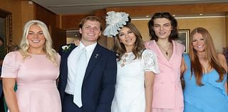 Elizabeth Hurley tenderly wraps her arm around ex Shane Warne's daughter Brooke as she reunites with the late cricketers children at Crown Oaks Day in Melbourne