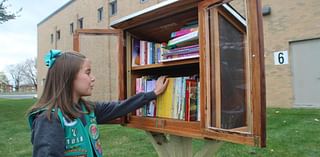 Girl Scout donates Little Free Library to Bloomington school